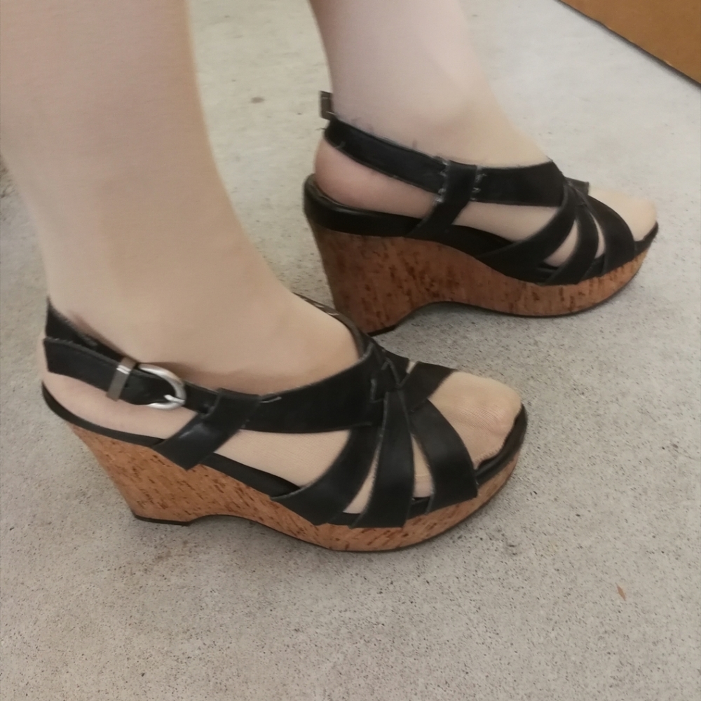 Cushioned black wedge heels